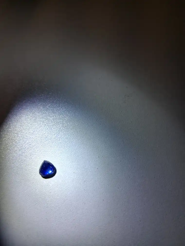 Sri Lankan blue sapphire heart shape under light