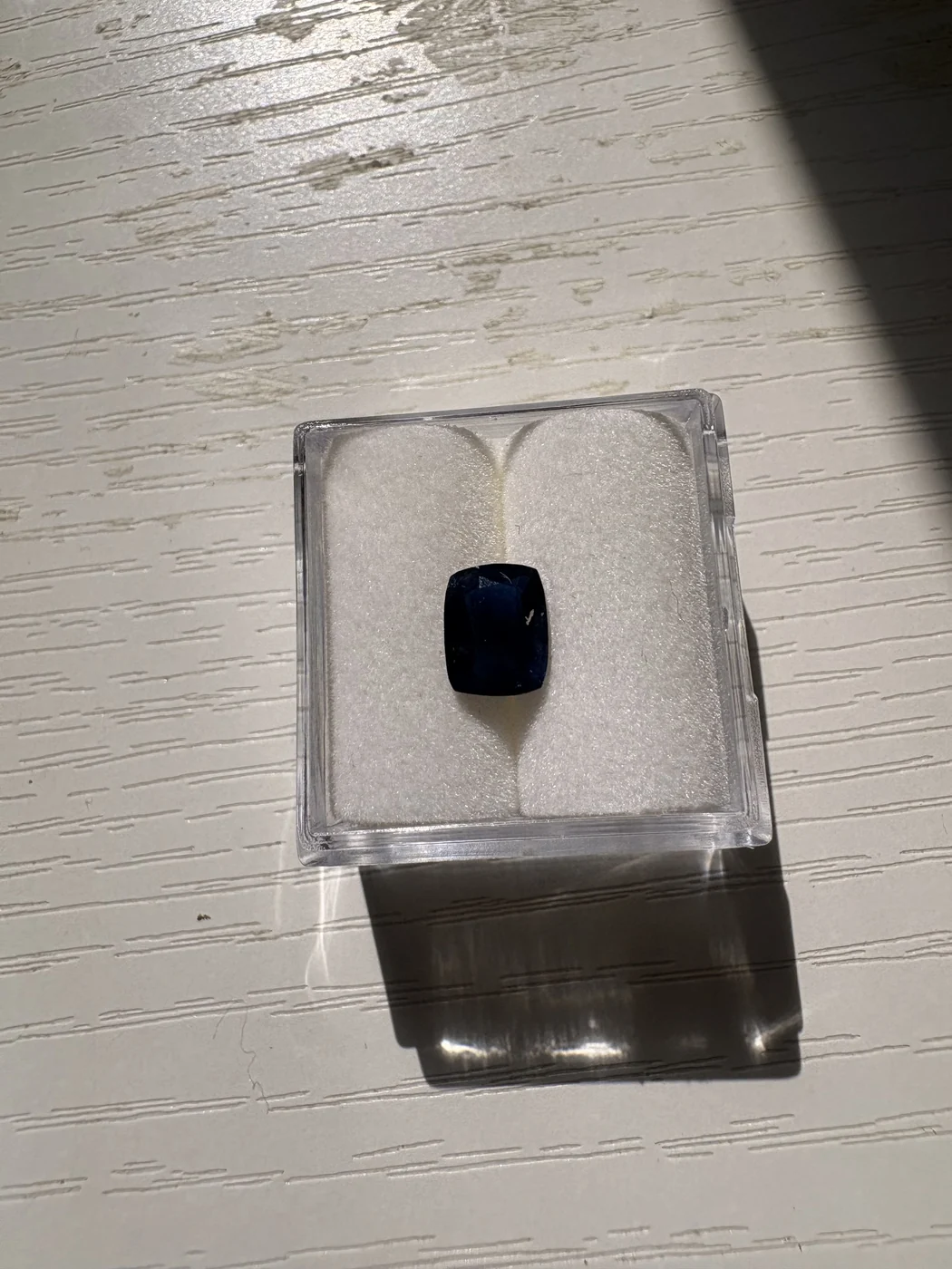 Front view of serial 109 rectangular cushion blue sapphire